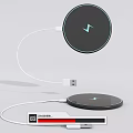 Wireless Charger with Circular Black Panel and White USB Charging Cable