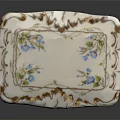 Floral Decorative Porcelain Box With Blue Flower Patterns Gold Accents And Carved Legs