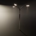 Bright Street Lights Illuminating Dark Urban Environment At Night