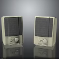 Pair of White Desktop Speakers With Control Knobs And Grilles On Black Surface 3d model