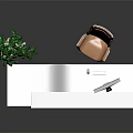 Modern White Reception Desk Furniture With Green Plant Computer Monitor And Brown Chair
