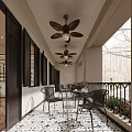 Café Outdoor Patio With Black Shutters Ceiling Fans And Wrought Iron Furniture