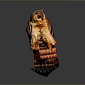 Detailed Brown Owl Statue Perched on a Stack of Old Books