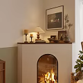 Cozy Fireplace With Burning Flames Table Lamp Candles And Framed Art