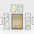 Gallery Wall Decor With Central Swan Painting And Surrounding Plant Leaf Prints