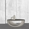 Modern Minimalist Coffee Table With Curved Design And Decorative Vase In Neutral Color