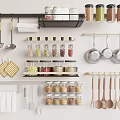 Organized Kitchen Wall With Hanging Pans Spatulas And Glass Jars For Spices