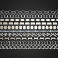 Various Decorative Metal Chain And Hexagonal Circular Patterns Arranged Neatly On Black Background