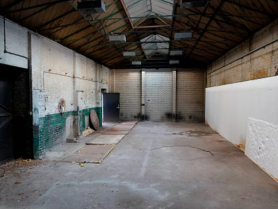 Abandoned Industrial Space Interior With High Ceiling Exposed Brick Walls And Concrete Floor 3d model