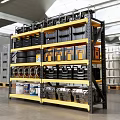 Industrial Warehouse Storage Space With Yellow Metal Shelving Toolboxes Tires And Containers