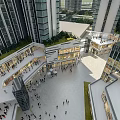 Modern Commercial Street With Tall Buildings Open Square Glass Facades Shops and Busy Crowds