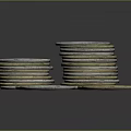 Intricately Sculpted Silver And Gold Coins With Detailed Carved Designs Stacked And Scattered