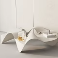 Modern White Wave Shaped Side Table With Glass Bottle And Books 3d model