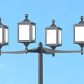 Classic Outdoor Light With Four Arm Design And Black Pole For Garden Illumination