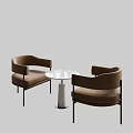 Brown Upholstered Leisure Chairs With Black Metal Legs And Round Glass Top Table