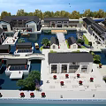 Traditional Modern Commercial District Featuring Water Ponds Pedestrian Walkways And Green Landscaping