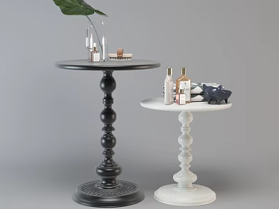 Black and White Side Tables with Ornate Pedestal Bases and Decorative Items 3d model