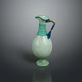 Light Green Ceramic Vase With Blue Striped Accents And Curved Handle