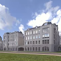 Multi Story School Building With Gray Exterior Large Windows And Green Lawn Under Blue Sky