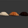 Three Different Colored Croissants White Butter And Chocolate On Dark Background