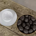 Rustic Wooden Table With White Ceramic Plate And Bowl Of Dark Fruits