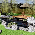 Lush Garden Water Fountain with Lily Pads Stone Path and Willow Trees