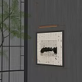 Black And White Landscape Painting On Dark Wooden Wall With Strip Light And Green Plant