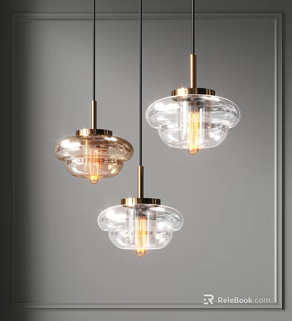 Three Modern Glass Pendant Lights with Brass Accents and Clear Shades 3d model 