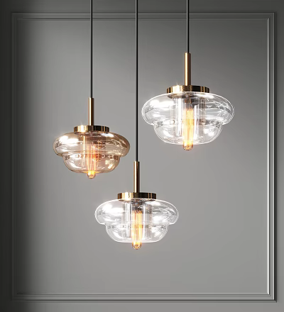 Three Modern Glass Pendant Lights with Brass Accents and Clear Shades 3d model