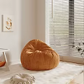 Orange Bean Bag Chair In Cozy Room Corner With Window Blinds And Wall Painting