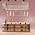 Stylish Hanging Structure Over Shelf With Bowls Cups And Green Plant On Pink Background