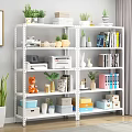 White Multi Tiered Bookshelf With Books Plants Storage Boxes And Decorations In Bright Indoor Space