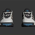 White Low Top Sneakers With Gray And Brown Panels Blue Soles And Gray Laces