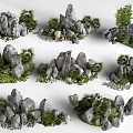 Various Decorative Rockery Stones With Small Plants And Moss For Garden Landscaping