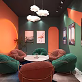 Vibrant Interior With Green Orange Sofas Round Table Cloud Chandeliers And Flamingo Paintings