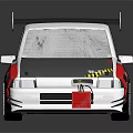 Modified White Rally Car Featuring Black Rear Spoiler Blue Front Section And Colorful Graphics
