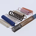 Assorted Metal Springs In Various Colors And Different Coil Shapes