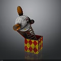 Clown Pop Up Toy With White Red Body In Red Yellow Checkered Box