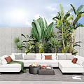 White Sectional Outdoor Sofa With Fire Pit Table And Lush Green Plants In Sunny Garden