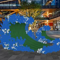 Outdoor Photo Spot With Green Wave Shaped Structure White Flowers And Modern Buildings