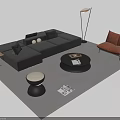 Modern Black L Shaped Sofa And Round Coffee Table With Brown Armchair Light Gray Rug