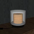 Modern Table Lamp With Transparent Glass Shade Yellow Lampshade Black Spiral Lines On Wooden Table