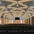 Indoor Basketball Court Featuring Arched Wooden Roof Skylights Scoreboard Wooden Panel Walls And Green Floor
