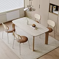Elegant Wooden Dining Table With Rattan Back Leather Chairs And Fruit Bowl On Woven Rug
