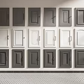 Gray And White Cabinet Doors With Various Handle Styles Arranged On Wall