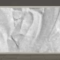 Elegant White Textured Background Wall With Sand Like Texture Golden Frame And Wooden Base