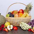 Assorted Fresh Fruits In Wicker Basket With Pineapple Apple Banana Cantaloupe Grapes And Strawberries