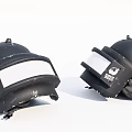 Two Black Helmets with Face Shields and Scratched Details on White Background 3d model