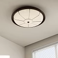 Round Ceiling Light with White Petal Pattern Lampshade and Dark Frame in Interior Space 3d model