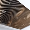 Modern Ceiling Design With Curved Wooden Slats Black Accents And Smooth Curves